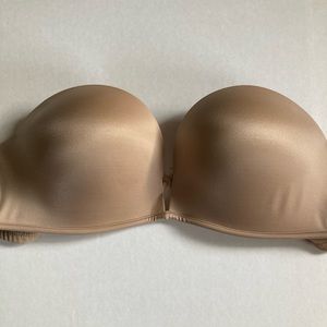 Victoria Secret Bombshell Strapless Bra. Size 32C. Color is Nude.